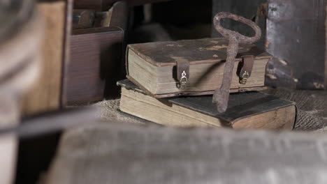 Rusty-key-on-old-books.-Close-up