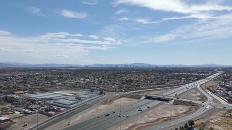 Flawless-aerial-shot-of-a-Las-Vegas-suburb,-Summerlin-area-,with-urban-freeway-loop