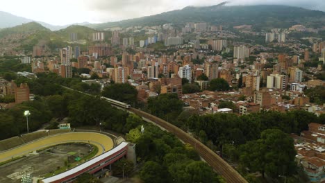 Establishing-Aerial-Shot-of-Life-in-a-Mountaineous-Medellin-City-Neighborhood