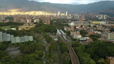 Subway-Metro-Train-Enters-Station-in-Medellin,-Colombia-Neighborhood