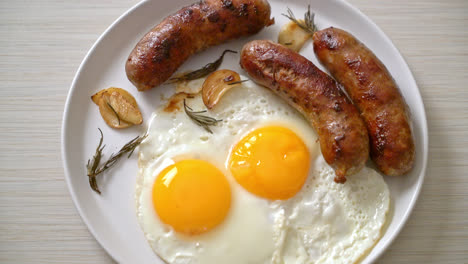 homemade-double-fried-egg-with-fried-pork-sausage---for-breakfast