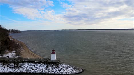 Flying-out-past-the-light-house-at-Lighthouse-Landing-in-Grand-Rivers,-Kentucky