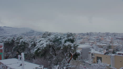 Snow-covered-residential-neighbourhood-bad-weather-rare-story-Medea-winter-scene-over-Athens
