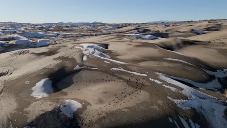 Aerial-view-of-the-dunes-of-Little-Sahara-Desert,-Utah,-wide-shot-forward