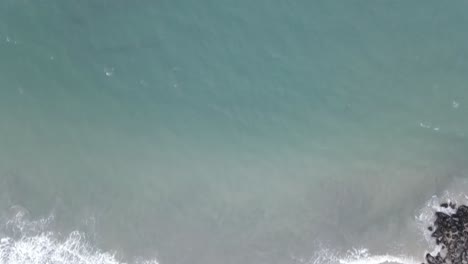 drone-view-of-flowing-ocean-waves