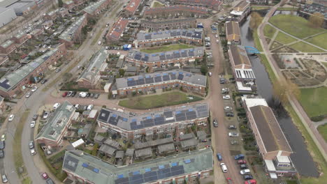 Aerial-of-houses-in-suburban-neighbourhood-with-solar-panels-on-rooftop