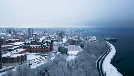 Picturesque-View-Of-Stadium-High-School-Filled-With-Snow-Near-Commencement-Bay-In-Tacoma,-Washington-In-Wintertime