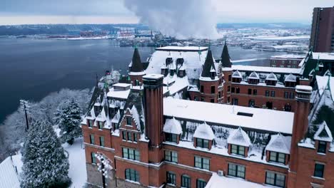 Stadium-High-School-And-Stadium-Bowl-Covered-With-Snow-With-Commencement-Bay-And-Industrial-Area-In-Background-In-Tacoma,-Washington,-USA