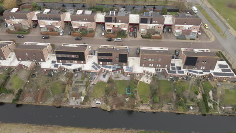 Aerial-of-solar-powered-houses-near-water