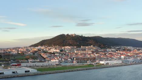 Viana-do-Castelo-picturesque-city-overlooked-by-Mount-of-Santa-Luzia---Aerial-pull-out-Fly-over