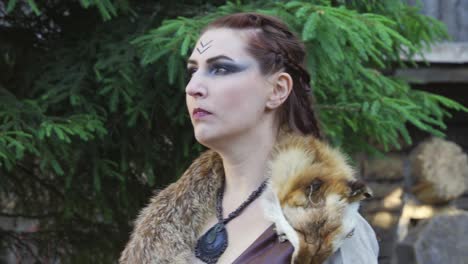 Viking-girl-with-ornamental-necklace-looking-into-the-distance