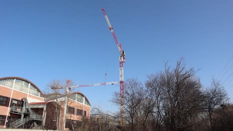 High-tower-cranes-work-on-construction-site
