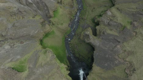 Top-down-view-of-Kverná-river-in-canyon-at-Kvernufoss-waterfall-in-Iceland