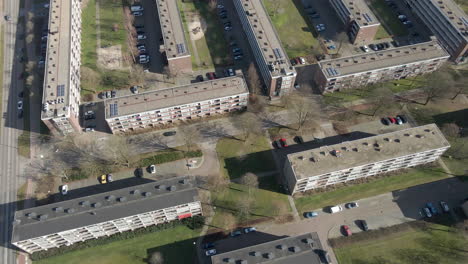 Flying-over-apartment-buildings-in-suburban-neighbourhood