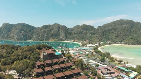 Tropical-stretch-of-land-connecting-Loh-Dalum-Beach-and-Tonsai-Beach-in-Ko-Phi-Phi-Don-Island-Paradise-in-Thailand---Aerial-panoramic-Fly-over-shot