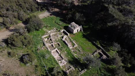 Aerial-pullback-over-the-historic-ruins-of-Pyrgos-tis-Rigenas,-Rigena-Tower-byzantine-monastery-in-Akamas,-Cyprus