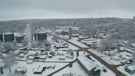 Industrial-building-in-drone-ascending-view-in-small-American-town