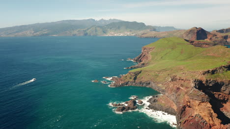 Wild-volcanic-coastline-of-East-Madeira-with-Ilhéu-da-Cevada,-aerial