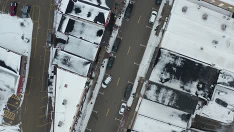 Top-down-ascending-view-of-small-American-county-town-in-winter-season