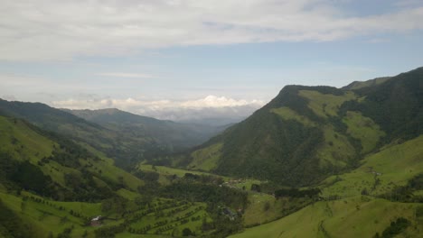 Backwards-Shot-Reveals-Cocora-Valley-and-Wax-Palm-Trees-in-Colombia