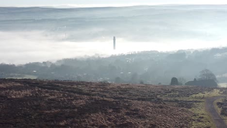 Lancashire-industry-town-countryside-aerial-cloudy-misty-valley-moorland-hillside-landscape-slow-reverse