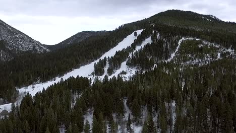 AERIAL---A-private-ski-run-in-Montana's-forest