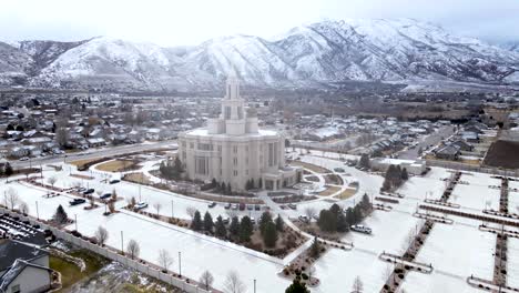 Payson-Utah-Temple---Church-of-Jesus-Christ-of-Latter-day-Saints-Near-Village-And-Snowy-Mountain-At-Early-Morning-In-Payson,-Utah,-USA
