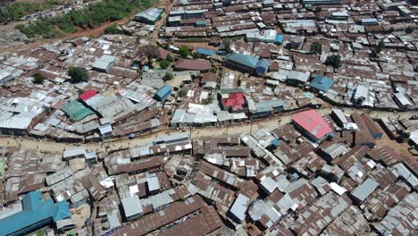 Top-down-aerial-video-of-Kibera-slums-in-Nairobi,-Showing-dense-population