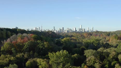 Slow-cinematic-drone-aerial-shot-of-the-Toronto-skyline-in-early-Autumn