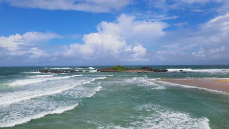 White-Frothy-Waves-Washing-The-Shore-Overlooking-Rocky-Headland-At-Sawtell-Beach-In-New-South-Wales,-Australia