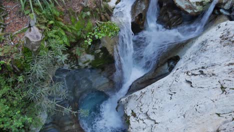 Small-whitewater-stream-finds-a-way-down-smooth-limestone-falls