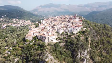 Aerial-landscape-view-of-Camerota-village-on-a-hilltop-on-the-Apennine-mountains,-Italy