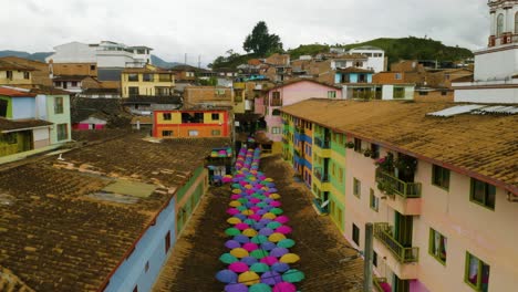 Establishing-Aerial-Shot-of-City-Street-with-Colorful-Umbrellas-in-South-America