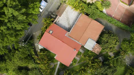 Top-Down-View-of-Private-Home-Surrounded-by-Lush-Greenery-and-Vegetation