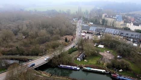 Traffic-moving-across-Road-bridge-Sawbridgeworth-Essex-UK-Aerial-footage