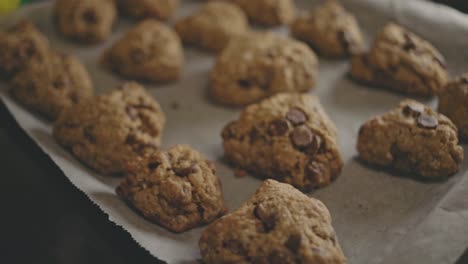 Soft-And-Chewy-Oatmeal-Chocolate-Chip-Cookies-On-Baking-Tray-With-Parchment-Paper