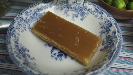 Brown-sugar-ingredient-placed-in-white-and-blue-deep-plate
