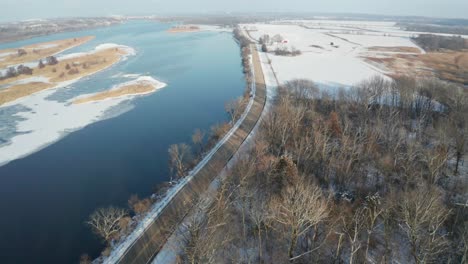 Beautiful-coastal-road-during-cold-winter-season-in-aerial-drone-tilt-view