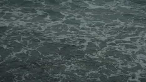 Ocean-waves-in-slow-motion-on-a-dark-day
