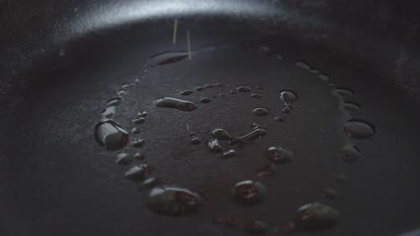 Adding-oil-onto-hot-frying-pan