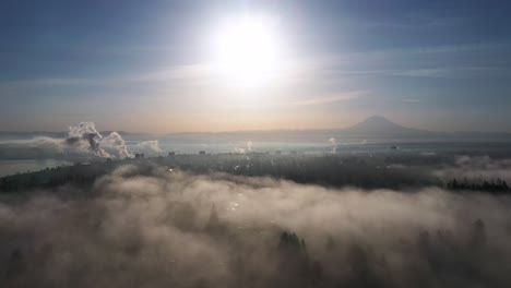 Cloud-Bank-With-Fog-Overlooking-Sunrise-Shining-Over-Tacoma-In-Washington-State,-USA
