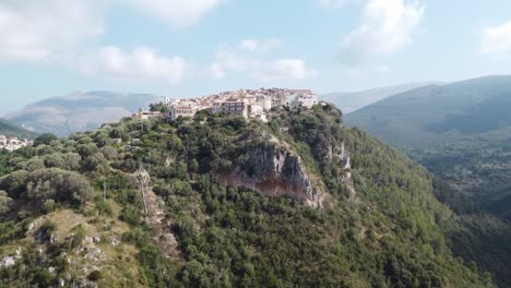 Aerial-landscape-view-of-Camerota,-italian-village-on-top-of-a-cliff-on-the-Apennine-mountains