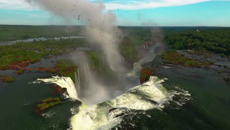 Aerial---Devil's-Throat-in-Iguazu-Falls,-Argentina,-wide-lowering-shot