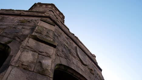Looking-up-Darwen-Jubilee-tower-historic-landmark-building-architecture-Lancashire-dolly-right