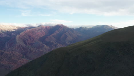 Serranias-El-Hornocal,-Cerro-De-14-Colores,-Argentina,-Wide-Aerial-Shot-Pan-Left