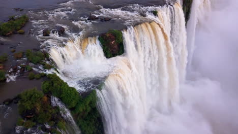 Aerial---Iguazu-Falls-and-river-in-Misiones,-Argentina,-wide-circle-shot