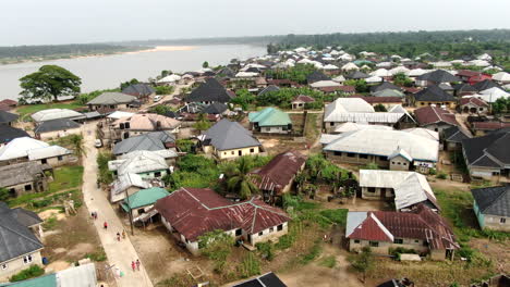 The-township-of-Odi-in-the-Bayelsa-State-of-Nigera---aerial-view-of-the-community-and-Nun-River