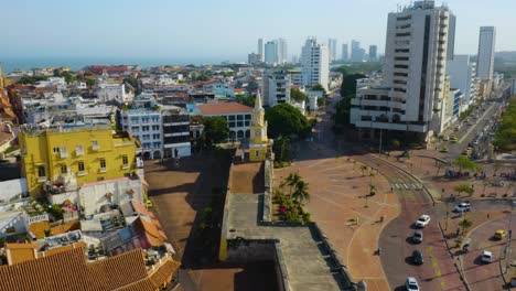 Aerial-Orbiting-Shot-of-Clock-Tower-Monument-in-Cartagena's-Old-City
