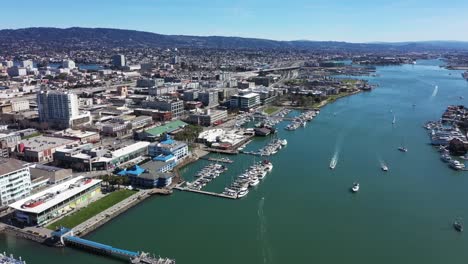 aerial-video-overlooking-Oakland-inner-harbor-and-Jack-London-Square-area-from-500'-up-and-moving-in-and-down
