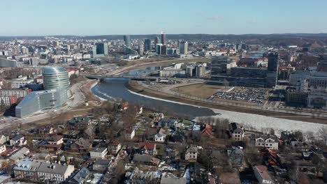 AERIAL:-Vilnius-From-Air-with-New-Office-Buildings-and-Old-Private-Houses-near-River-Neris